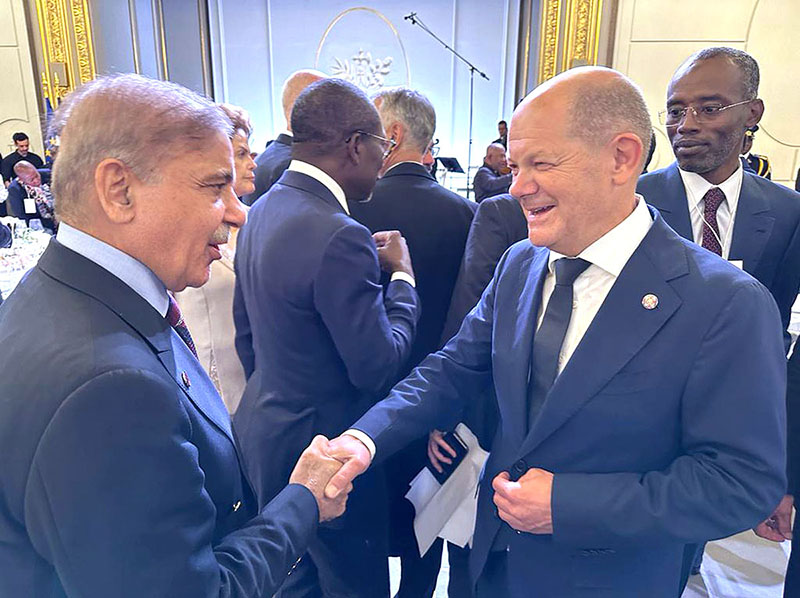 Prime Minister Muhammad Shehbaz Sharif meets German Chancellor Olaf Scholz on the sidelines of the Summit for a New Global Financial Pact