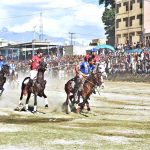 Players from GB Nalter and GB Sub Division 01 teams in action during the Jashn-e-Baharan Freestyle Polo Tournament at Aga Khan Shahi Polo Ground