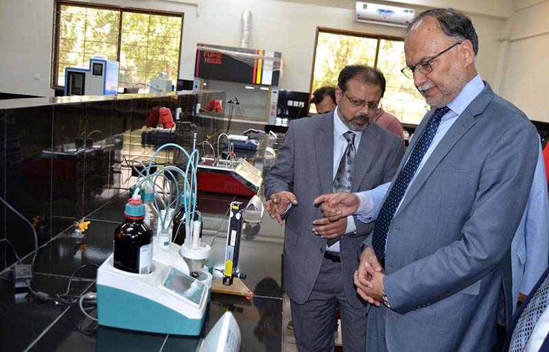 Federal Minister for Planning Development and Special Initiatives Prof. Ahsan Iqbal visiting lab of the institute after the inauguration of the new building of Energy and Environment Engineering at University of Punjab