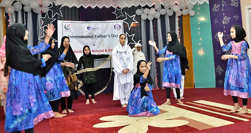 Students performing tableau on the occasion of International Father's Day organized by Bardasht Organization at Khubaibe Girls School & College