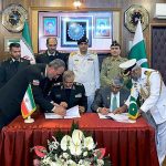 Secretary Defence Lt. Gen (Retd) Hamood Uz Zaman Khan and Commander Border Guards of Islamic Republic of Iran Brig. General Ali Goudarzi signing MoU