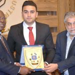 Acting President Wahab Jahangir presenting a shield to Ambassador Muhammad Bello Abioye high commissioner Nigeria to Pakistan at SCCI