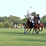 Players struggling to get control on the ball during final of Junior Polo Exhibition Match played between Islamabad Club Junior and Dubai Polo and Equestrian Club Junior teams at Islamabad Club Polo Ground