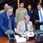 Prime Minister Muhammad Shehbaz Sharif signing Budget 2023-24 documents after its approved by the Cabinet to be laid before the National Assembly