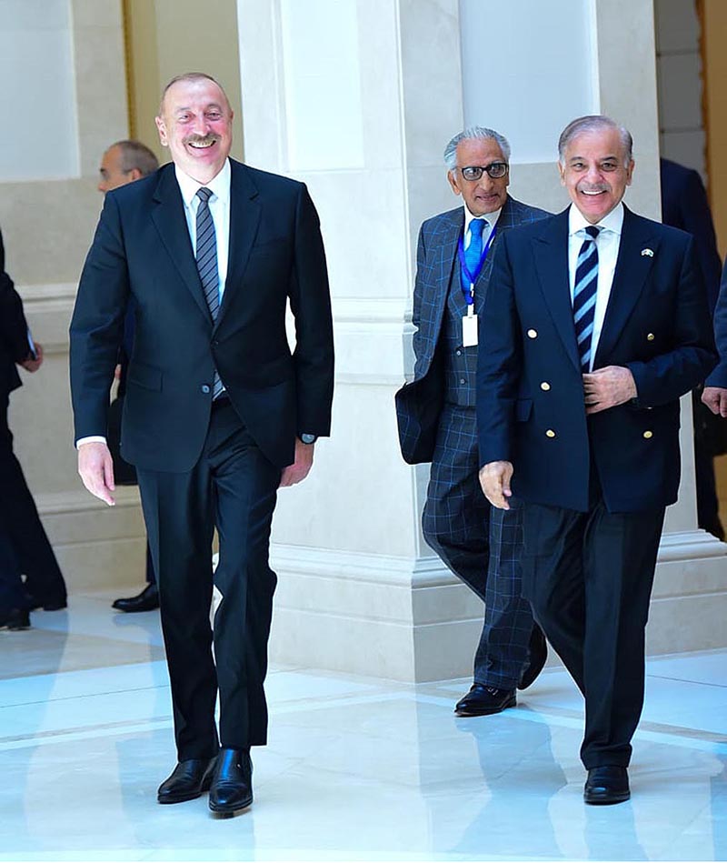Pakistan Prime Minister Muhammad Shehbaz Sharif and Azerbaijan President Ilham Aliyev sharing a light moment after their meeting in Zugulba, Azerbaijan's Presidential Palace