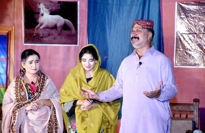 Artists performing drama 