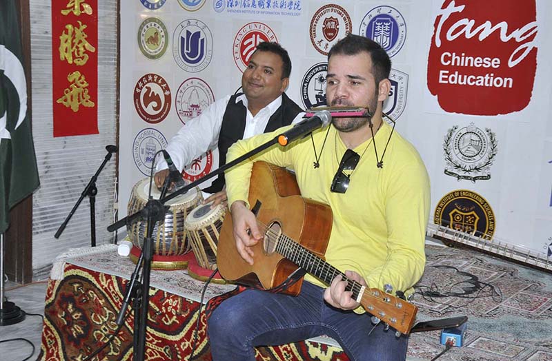 Participants in a group photo during the Dragon Boat Festival Pak-China Cultural Exchange programme