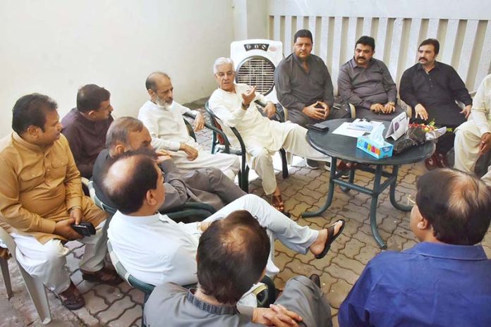 Defense Minister Khawaja Muhammad Asif listening to the people's complains at his residence in Cantt