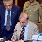 Prime Minister Muhammad Shehbaz Sharif signing Budget 2023-24 documents after its approved by the Cabinet to be laid before the National Assembly