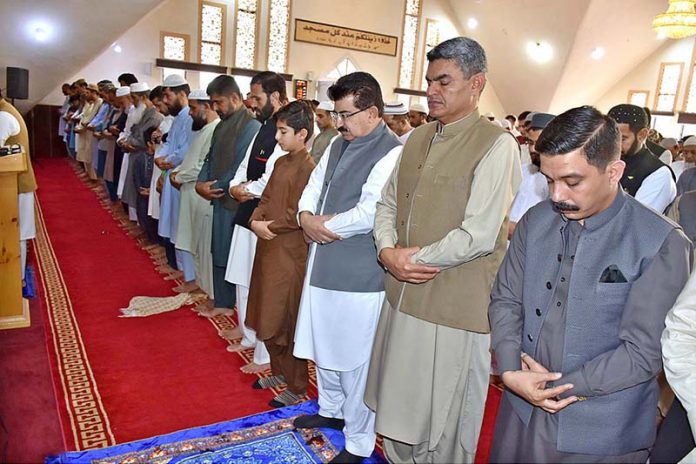 Acting President Muhammad Sadiq Sanjarani offering Eid-ul-Azha prayers