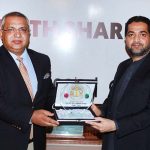 Balochistan Home Minister Ziaullah Langu distributing shields among the participants during ceremony of Friends of China Forum