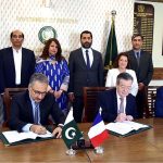 Dr. Kazim Niaz, Federal Secretary, Ministry of Economic Affairs, H.E. Mr. Nicolas Galey, Ambassador of France, and Mr. Philippe Steinmetz, Country Director, French Development Agency (AFD), signs the Credit Facility Agreement worth €180 million to finance the National Transmission and Despatch Company (NTDC)