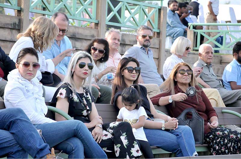 Spectators watching final of Junior Polo Exhibition Match played between Islamabad Club Junior and Dubai Polo and Equestrian Club Junior teams at Islamabad Club Polo Ground