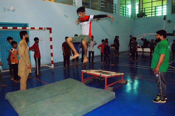 Players in action during Punjab Sports Board Coaching and Training Summer Camp 2023 include different games like table tennis, badminton, karate, gymnastic and taekwondo at City Sports Complex