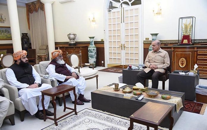 President JUI-F Maulana Fazl-Ur-Rehman and Federal Minister for Communications Maulana Asad Mahmood calls on the Prime Minister Muhammad Shehbaz Sharif