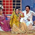 Artists performing in stage drama "Ghungroo” during Sindh Theatre Festival 2023 at ZA Bhutto Open Air Theater