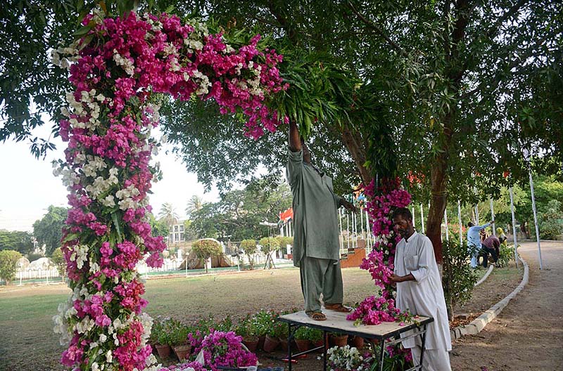 Workers busy in preparations for Eid-ul-Adha congregation at Polo Ground, Gulshan-e-Jinnah Park