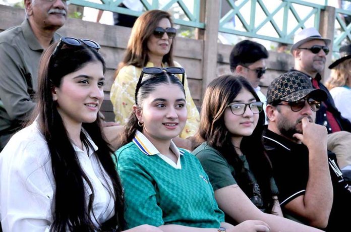 Spectators watching final of Junior Polo Exhibition Match played between Islamabad Club Junior and Dubai Polo and Equestrian Club Junior teams at Islamabad Club Polo Ground