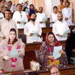 Newly elected different Town Committees Councilors taking oath during oath talking ceremony at Begum Nusrat Bhutto Auditorium Jinnah Bagh