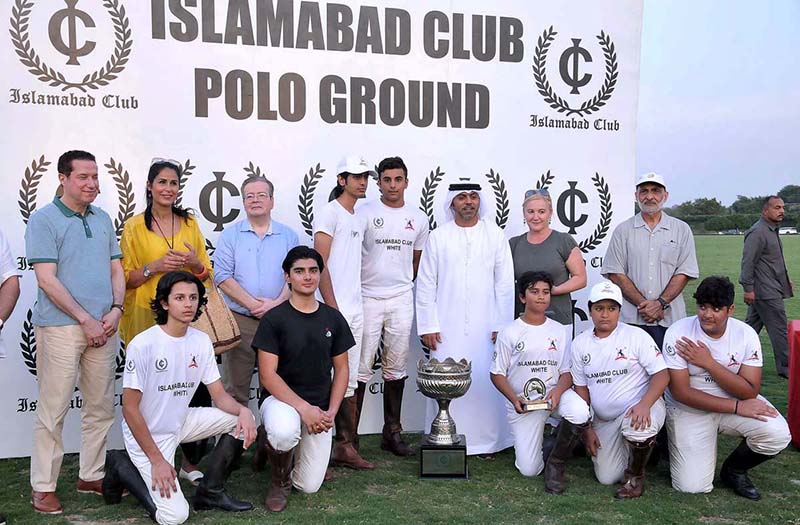 Ambassador of UAE in Pakistan H.E. Hamad Obaid Ibrahim Salem AlZaabi in a group photograph with players of Islamabad Club Junior team winner of final Junior Polo Exhibition Match during prize distribution ceremony at Islamabad Club Polo Ground