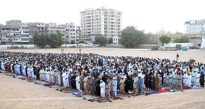 A large number of faithful offering Eid-ul-Azha prayers at Railways Ground