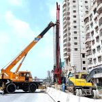 A view of ongoing development work for the Red Line Bus Service named as (Peoples Bus Service) at University Road in Provincial Capital