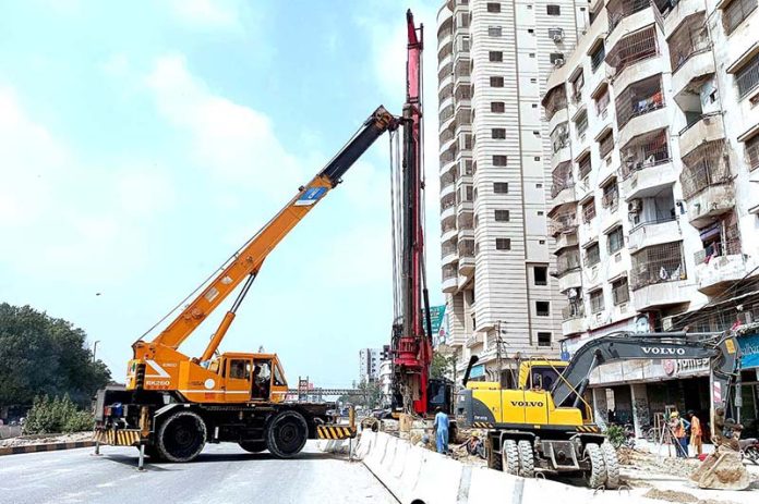A view of ongoing development work for the Red Line Bus Service named as (Peoples Bus Service) at University Road in Provincial Capital