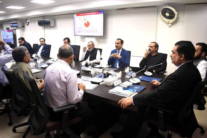 Federal Minister for Power Khurram Dastgir Khan presiding over the meeting of LESCO officials at LESCO Headquarter
