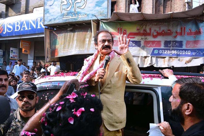 Federal Minister for Interior Rana Sana Ullah Khan is addressing the traders and businessmen during a gathering in Karkhana Bazaar
