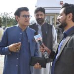 Qadir Khan Mandokhel, Chairman Special Committee on Affected Employees talking to media persons while arrives to attend budget session at Parliament House