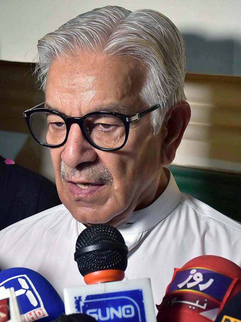 Defense Minister Khawaja Muhammad Asif talking to media persons after inaugurating Wall of Sialkot for pay tribute to martyrs of Nishan-e-Haider of Pakistan at Chowk Allama Iqbal.