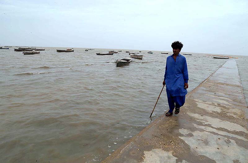 A view of large number of boats parked at zero point before cyclone Biparjoy approaches the coast area