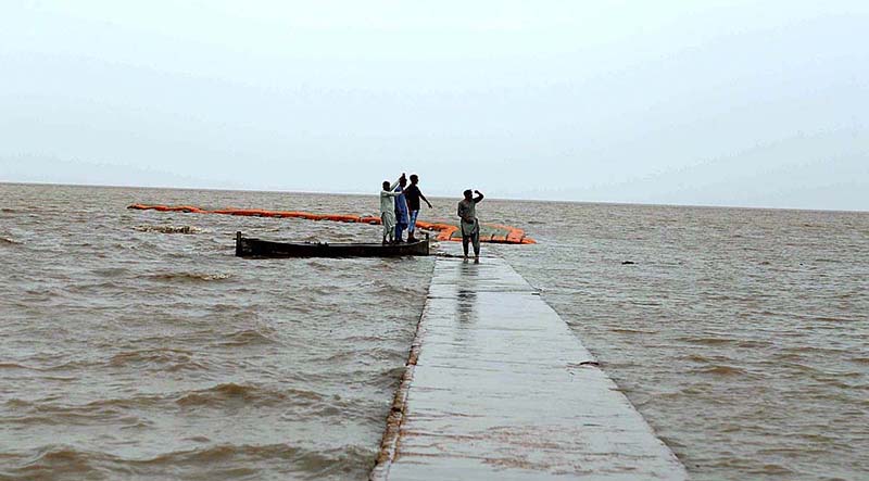 A view of large number of boats parked at zero point before cyclone Biparjoy approaches the coast area