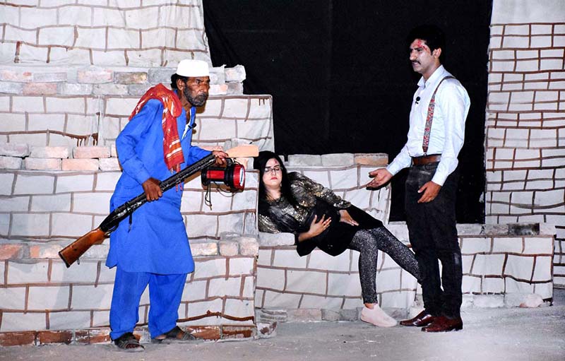Artists performing in stage drama "Mohen Jo Paraado" during Sindh Theatre Festival 2023 at ZA Bhutto Open Air Theater Arts Council