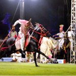 Horse rider hits the target during the all Pakistan Neza Bazi Competition at Lahore Polo Club