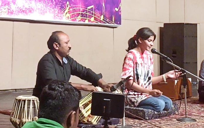 Artists performing on the stage during ceremony on the Occasion of World Music Day at Al Hamra