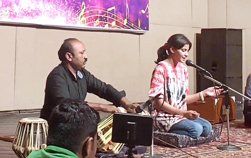 Artists performing on the stage during ceremony on the Occasion of World Music Day at Al Hamra