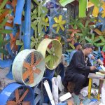 An electrician busy to repairing room-coolers at his workplace in the Provincial Capital