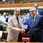 Prime Minister Muhammad Shehbaz Sharif shaking hands with Federal Minister for Finance Muhammad Ishaq Dar after the budget speech 2023-24 in the National Assembly