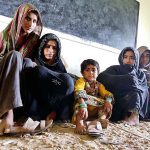 Family of Zero point area sitting on relief camp at Ahmed Rajo village before cyclone approaches the coast area