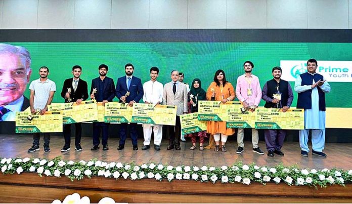 Prime Minister Muhammad Shehbaz Sharif in a group photo with the winners of PM’s National Innovation Award