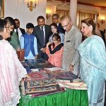 President Dr. Arif Alvi along with Begum Samina Arif Alvi watching handicrafts and artifacts prepared by special children of Association of Retarded Children School Karachi at Governor House