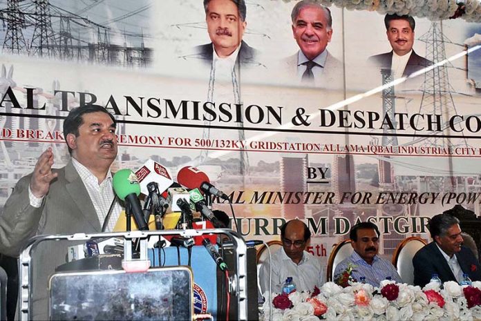 Federal Minister for Power Engineer Khurram Dastgir Khan is addressing a gathering after lying foundation stone for the construction of 500/132-KV grid station of Allama Iqbal Industrial City (AIIC) near Sahianwala