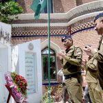 Additional IG Punjab Highway Patrol Rao Abdul Kareem offering dua after laying floral garland on the monument of Shuhda of Punjab Highway Patrol during his visit to Regional PHP Office Faisalabad