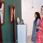 Students of Kinnaird College for Women taking keen interest in Textile Exhibition at Al-Hamra Art Gallery