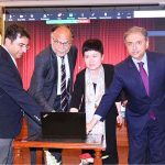 Federal Minister for Planning, Development and Reform Ahsan Iqbal and Chinese Ambassador for Pakistan H.E. Ms. Pang Chunxue press the button to perform Curtain-Raiser Event Celebrating 10Years of CPEC at Auditorium Ministry PD&SI