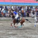 Players in action during the 1st final of Jashn-e-Baharan Freestyle Polo Tournament at Agha Khan Shahi Polo Ground