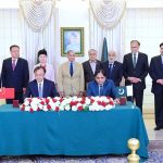 Wang Yongge, President of China National Nuclear Corporation Overseas Ltd (CNOS) and Muhammad Saeed Ur Rehman, Member Power, Pakistan Atomic Energy Commission (PAEC) signing an agreement for Unit 5 of Chashma Nuclear Power Plant (C-5). Prime Minister Muhammad Shehbaz Sharif, Ms. Pang Chunxue chargée d'affaires China, Shen Yanfeng, Vice President of China National Nuclear Corporation witnessed the signing ceremony