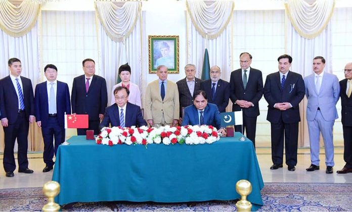 Wang Yongge, President of China National Nuclear Corporation Overseas Ltd (CNOS) and Muhammad Saeed Ur Rehman, Member Power, Pakistan Atomic Energy Commission (PAEC) signing an agreement for Unit 5 of Chashma Nuclear Power Plant (C-5). Prime Minister Muhammad Shehbaz Sharif, Ms. Pang Chunxue chargée d'affaires China, Shen Yanfeng, Vice President of China National Nuclear Corporation witnessed the signing ceremony Wang Yongge, President of China National Nuclear Corporation Overseas Ltd (CNOS) and Muhammad Saeed Ur Rehman, Member Power, Pakistan Atomic Energy Commission (PAEC) signing an agreement for Unit 5 of Chashma Nuclear Power Plant (C-5). Prime Minister Muhammad Shehbaz Sharif, Ms. Pang Chunxue chargée d'affaires China, Shen Yanfeng, Vice President of China National Nuclear Corporation witnessed the signing ceremony