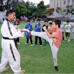 Student in action in karate class during summer camp at Foundation Public School Defense Campus